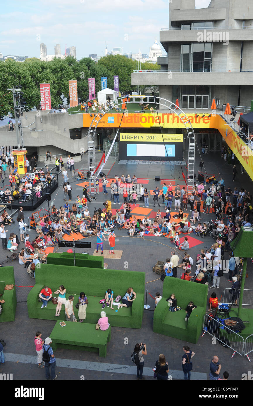 Crowds on the South Bank in London watching an outside show at the National Theatre UK Stock Photo