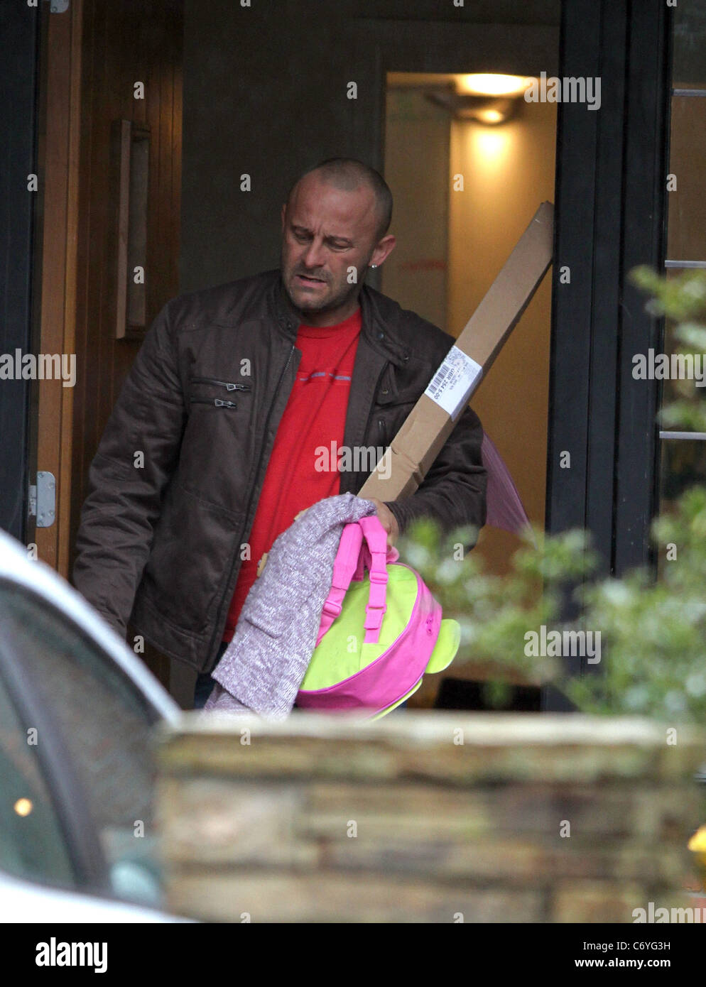 Mark Croft leaves Kerry Katona's home after collecting their children Cheshire, England - 20.03.10 Stock Photo