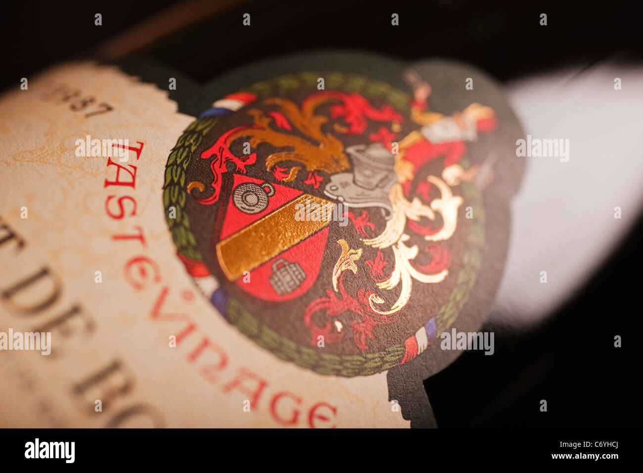La Confrerie des Chevaliers du Tastevin crest on a bottle of Cremant de Bourgogne wine bottle La Confrerie des Chevaliers du Tastevin crest on a bottle of Cremant de Bourgogne wine bottle