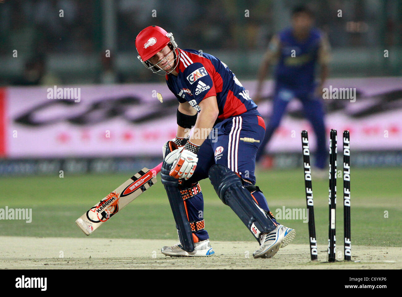 Delhi Daredevils player David Warner bowled out by Rajasthan Royals player Sumit Narwal during their match at the Indian Stock Photo