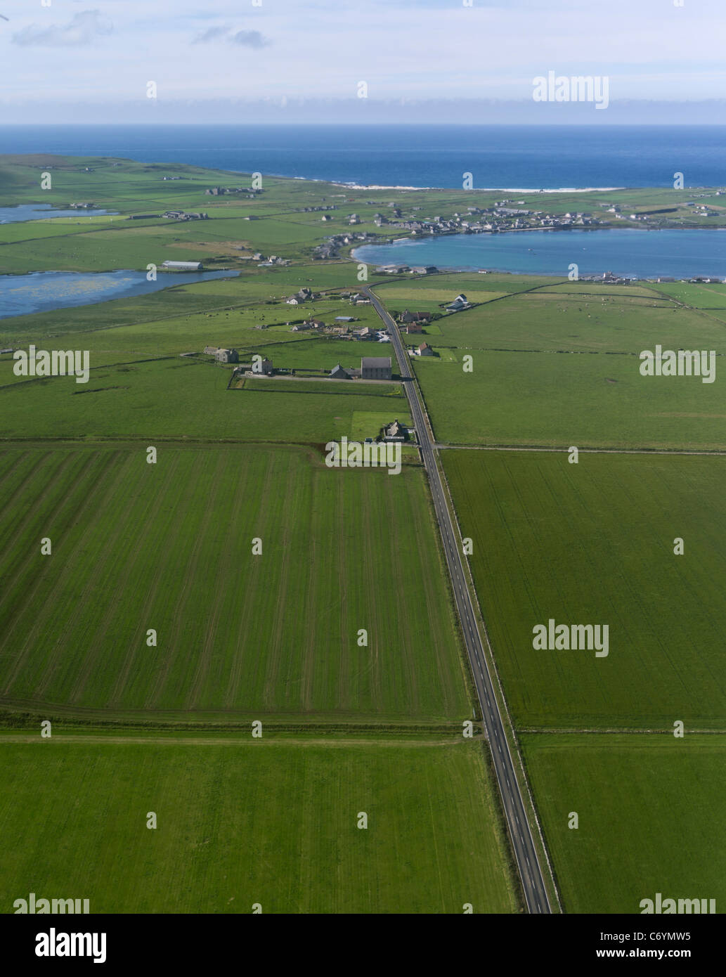 dh Pierowall WESTRAY ORKNEY Road leading into Pierowall Westray countryside view from above aerial remote islands landscape island orkneys Stock Photo