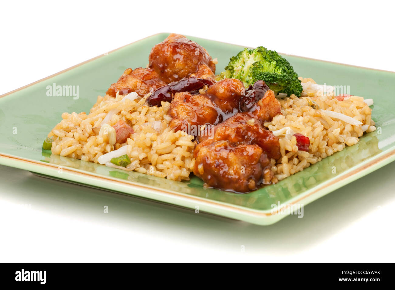 A plate of General Tsos chicken with broccoli and pork fried rice
