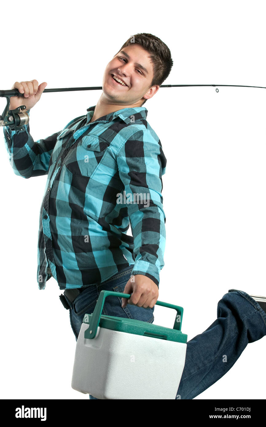 A young man poses with his fishing reel and beer cooler isolated over a white background. Stock Photo