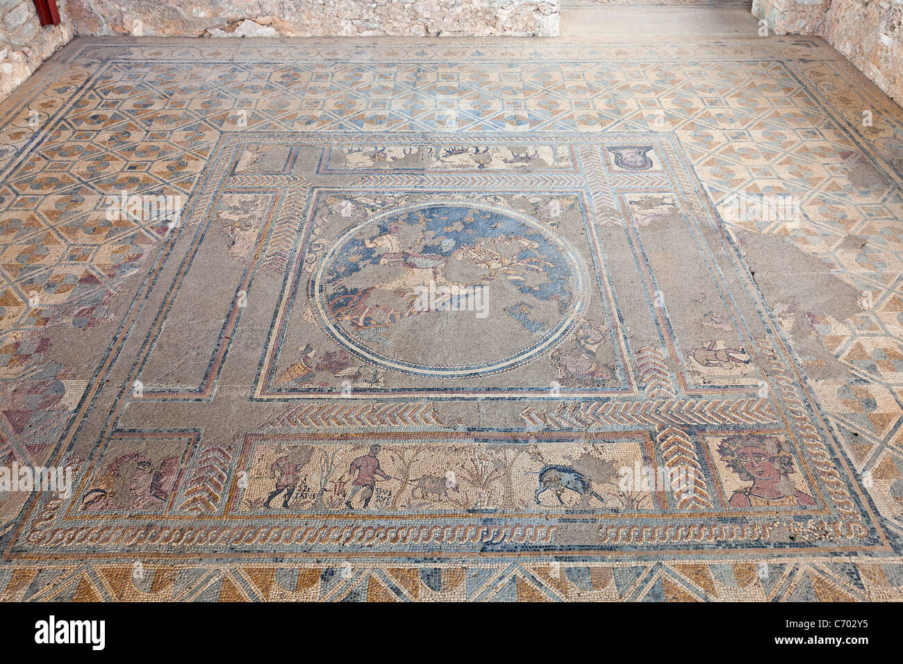 Mosaic with a Quadriga, Hunt Scenes and the Seasons (corners) in the House of the Fountains Villa in Conimbriga, Portugal. Stock Photo