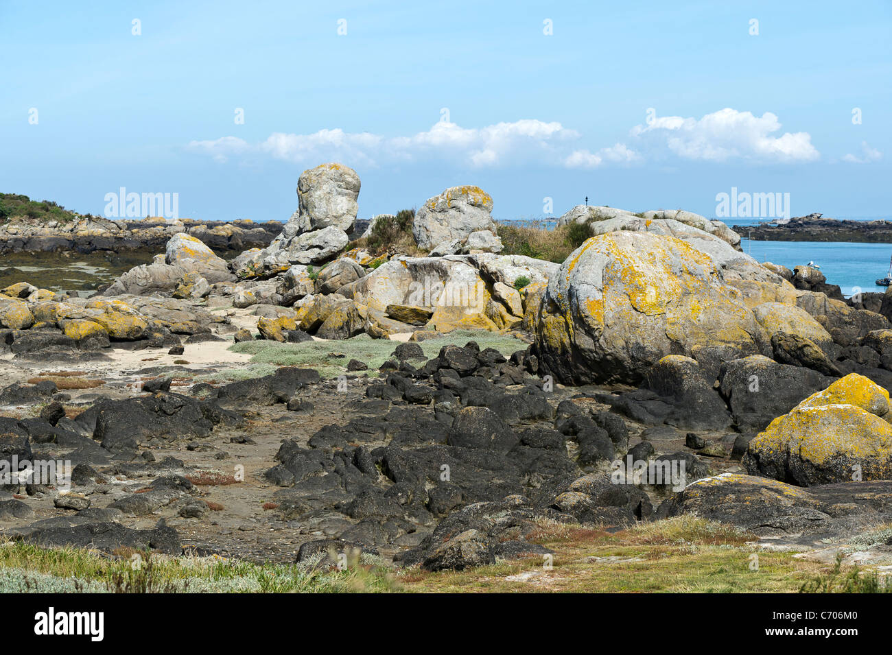 Huge rocks exposed at low tide on the Chausey islands off the coast of Normandy, France. Stock Photo