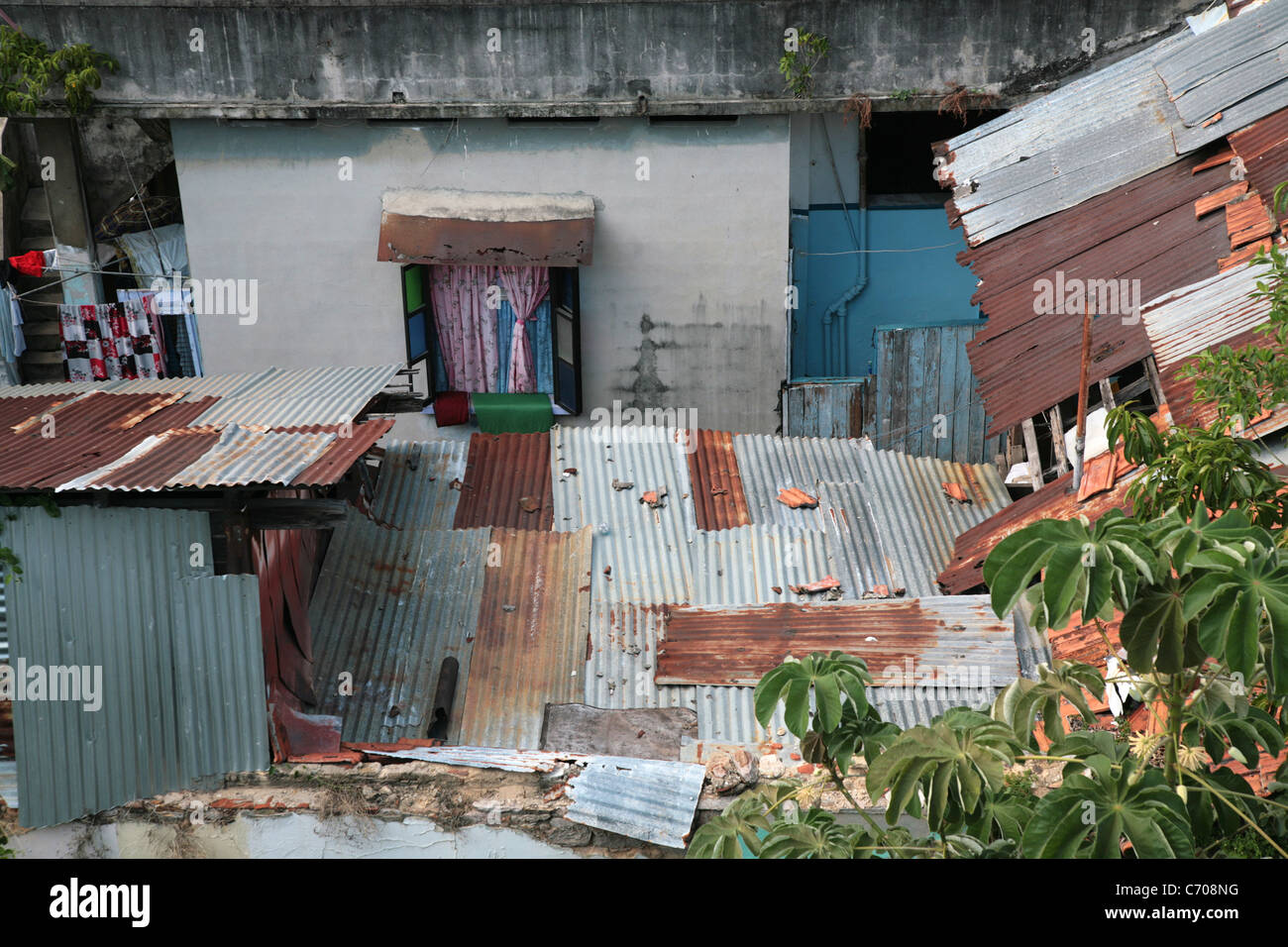 Old buildings used for housing by low income people in Panama city. Stock Photo