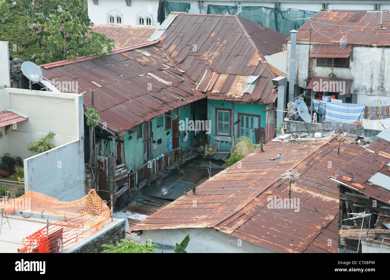 Old buildings used for housing by low income people in Panama city. Stock Photo
