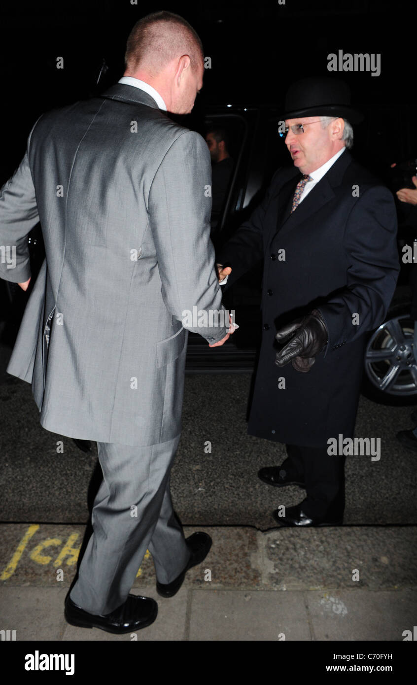Guy Ritchie leaving Scotts restaurant handing the doorman a Â£50 tip ...