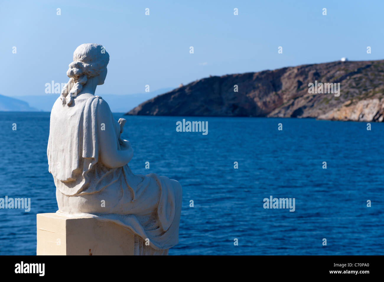 Statue of a woman overlooking the bay of Katapola, on the Greek Cyclade
