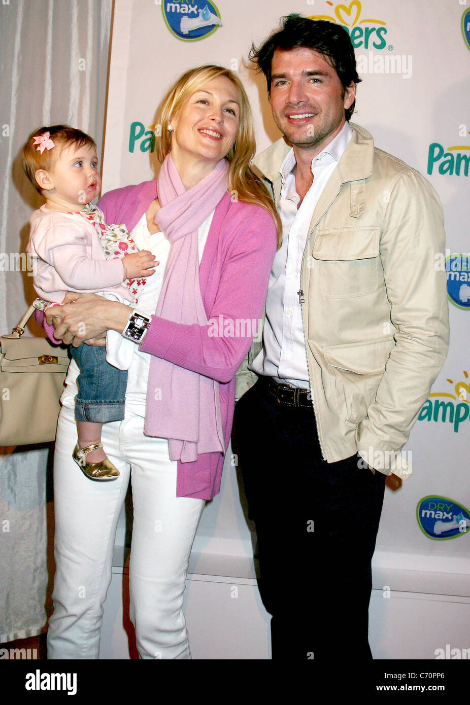 Matthew Settle, Kelly Rutherford and daughter Helena, at the Pampers