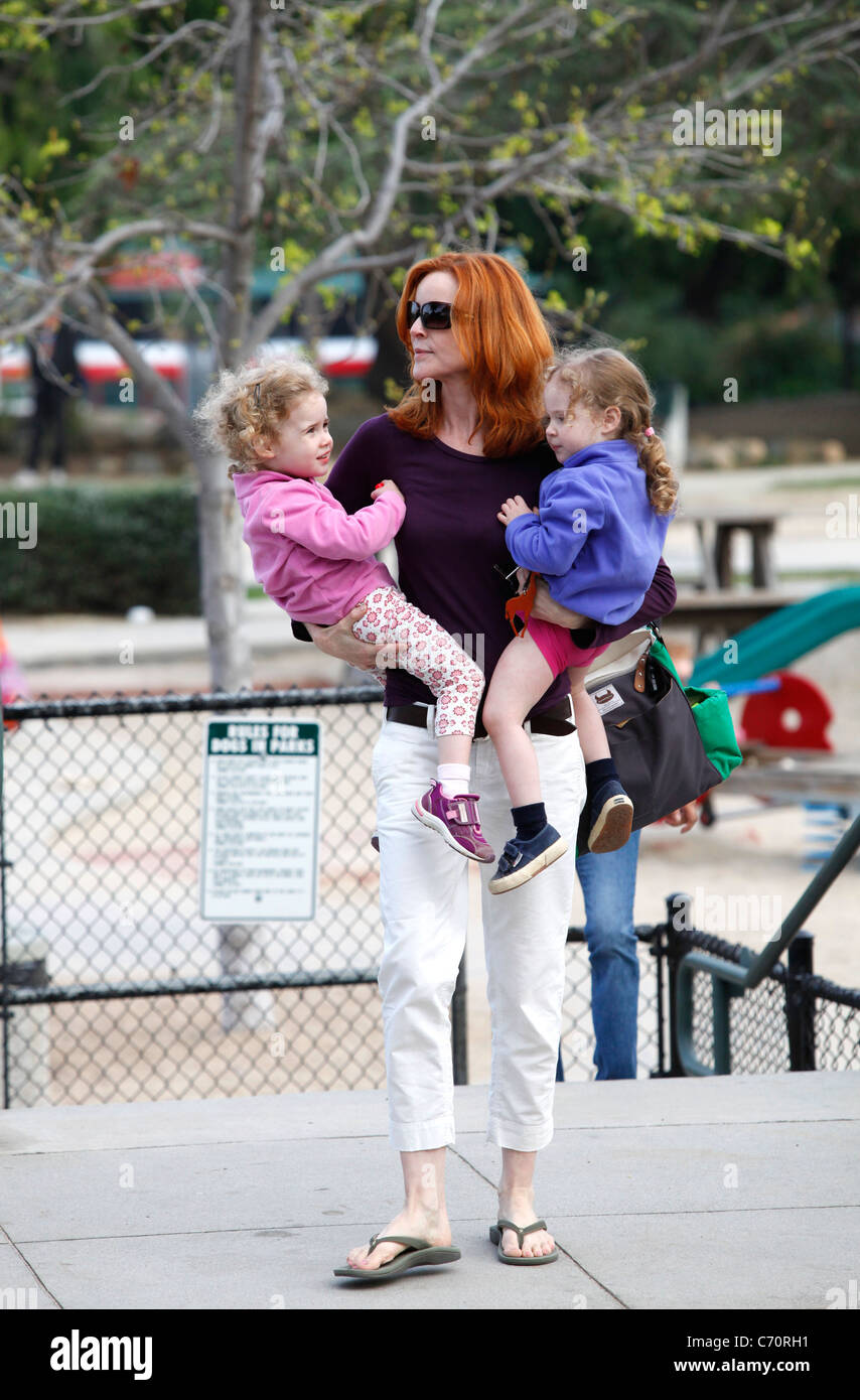 Marcia Cross takes her twin daughters Eden and Savannah to a playground
