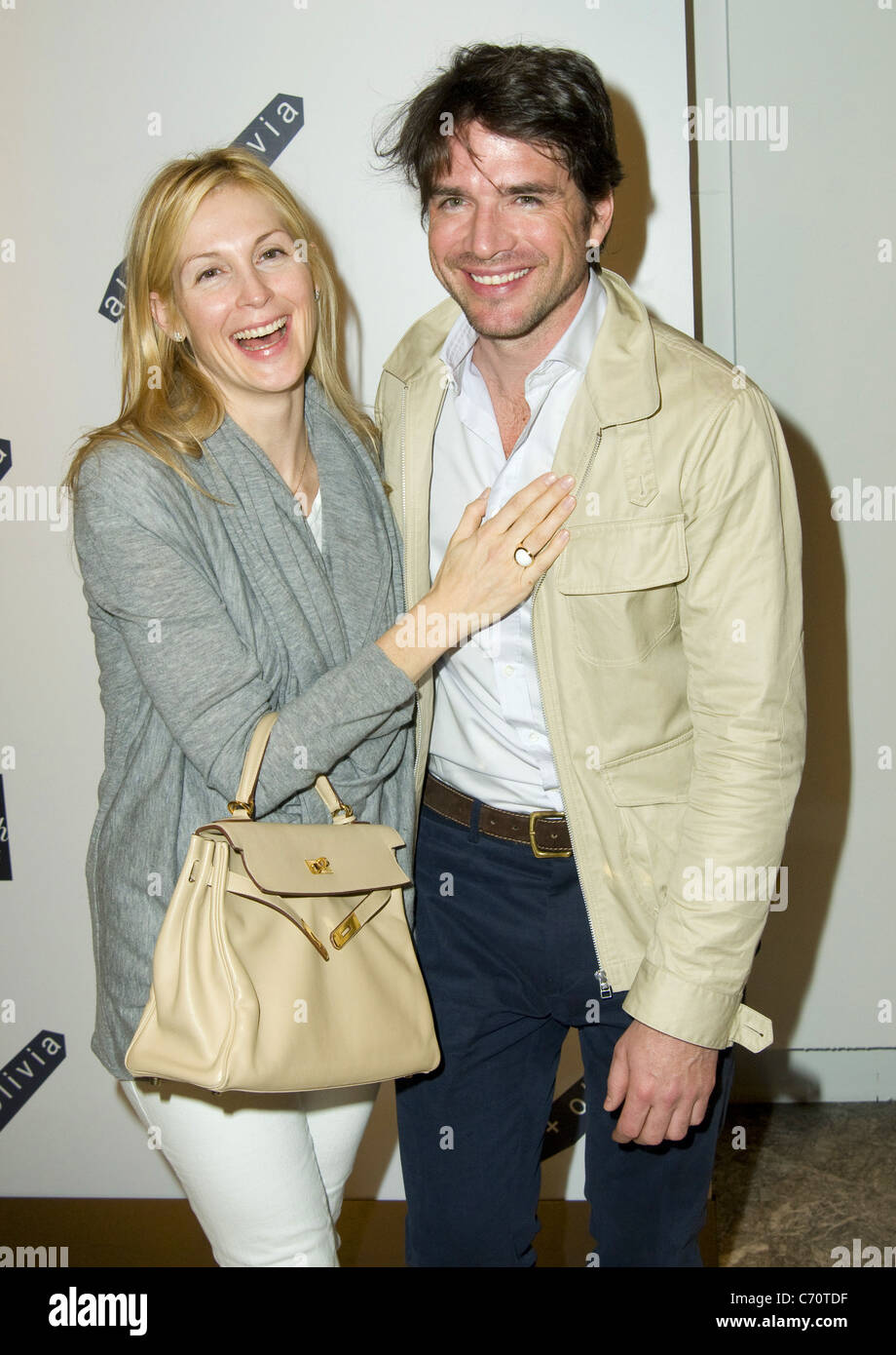 Kelly Rutherford and Matthew Settle Alice + Olivia by Stacey Bendet