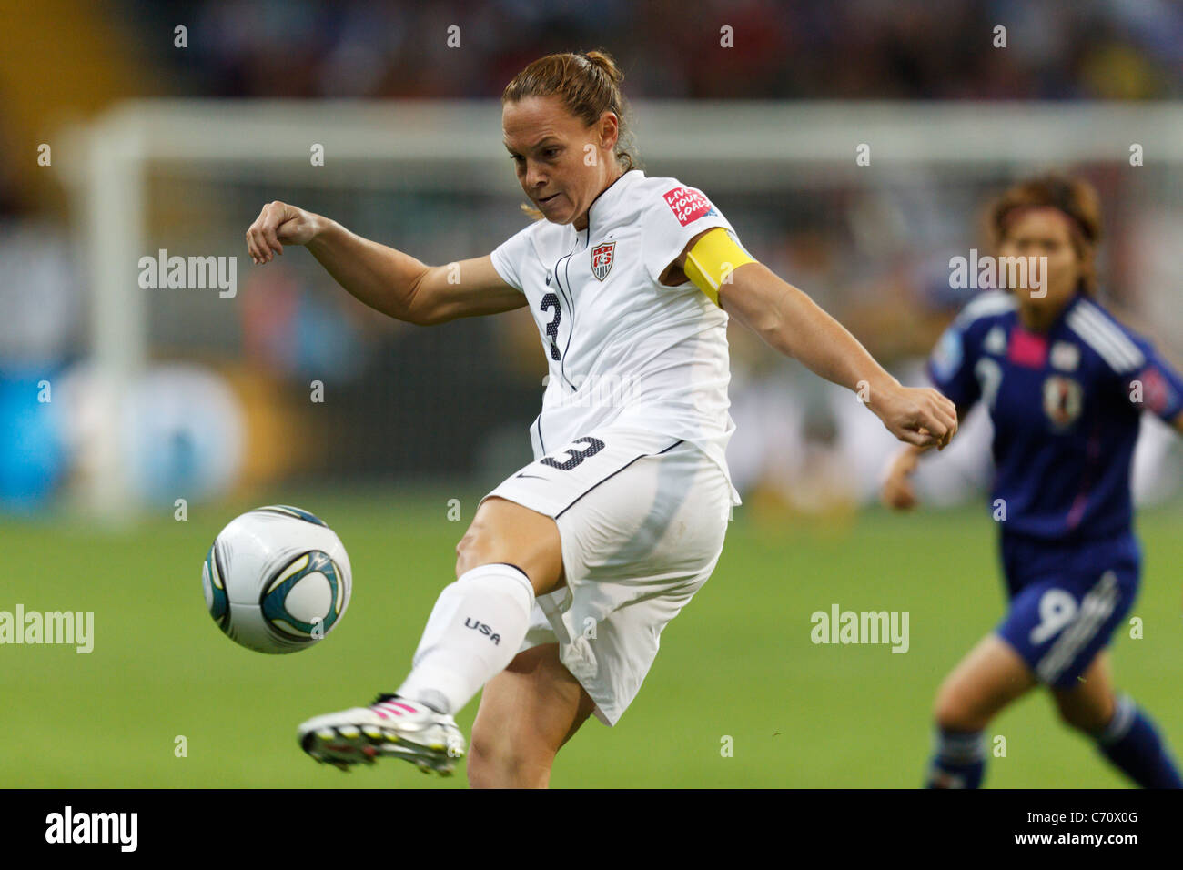 United States team captain Christie Rampone clears the ball during the FIFA Women's World Cup final against Japan July 17, 2011. Stock Photo