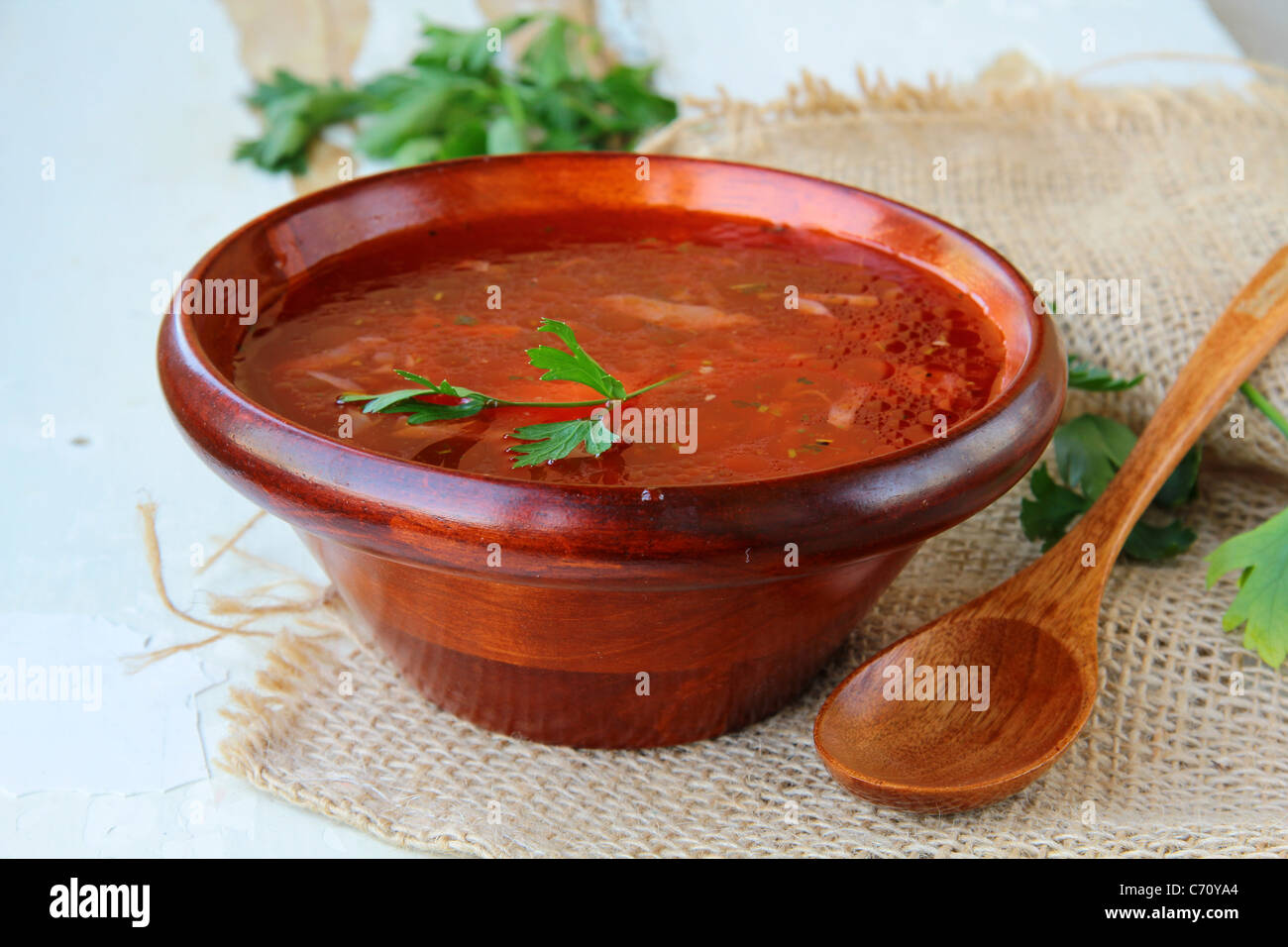 traditional Russian ukrainian borscht soup at a wooden table Stock Photo