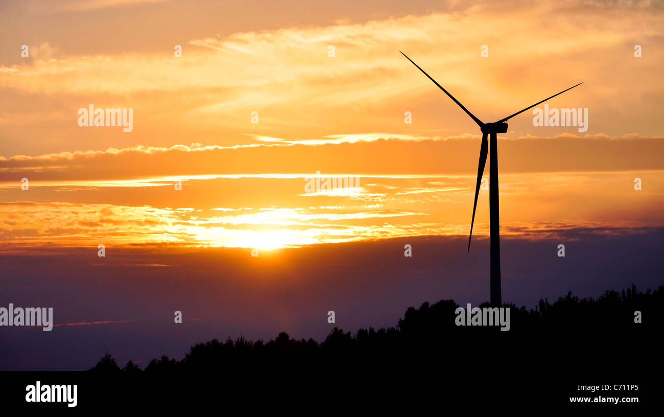 Silhouette of wind turbine during sunset Stock Photo - Alamy