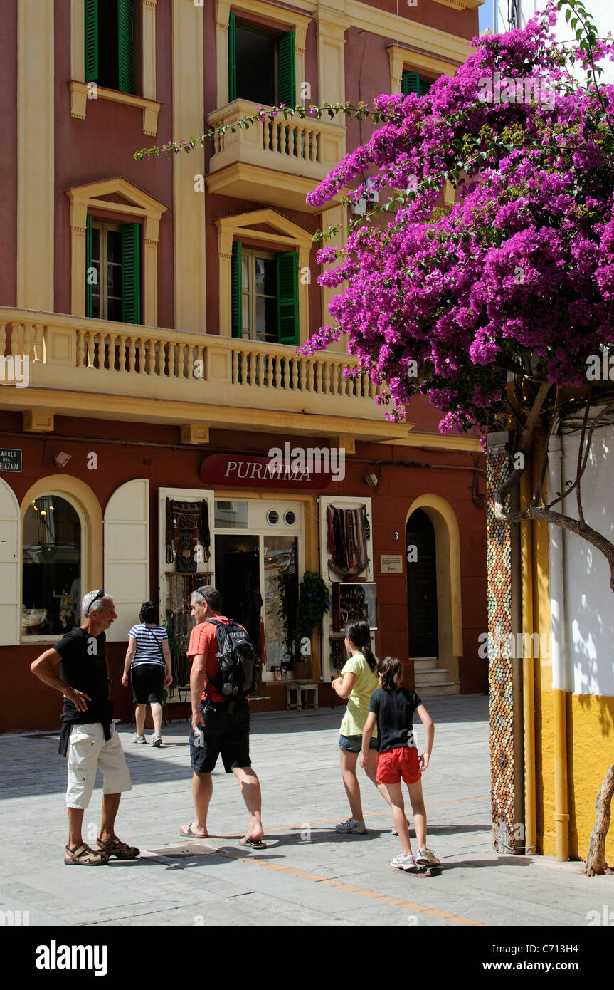 Town centre of Eivissa Ibiza island Spain with flowering Bougainvillea tree Stock Photo