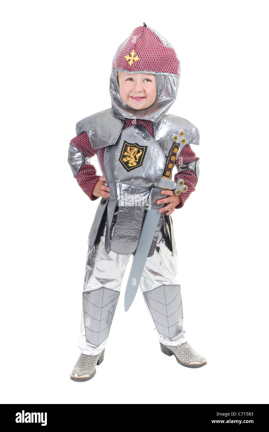Adorable little boy dresses up and pretends to be medieval renaissance knight with sword and hat Stock Photo