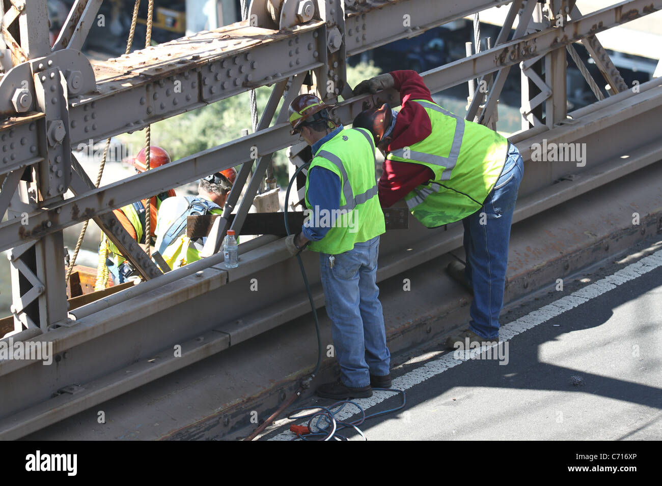Brooklyn bridge construction workers hires stock photography and