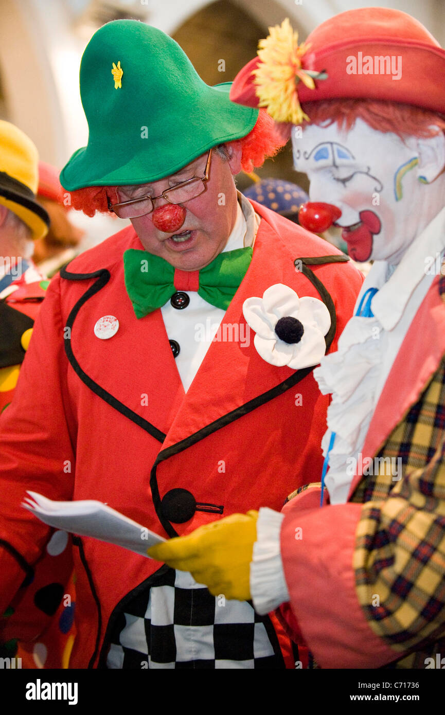 Clowns attend a church service in memory of the clown Joseph Grimaldi Stock Photo