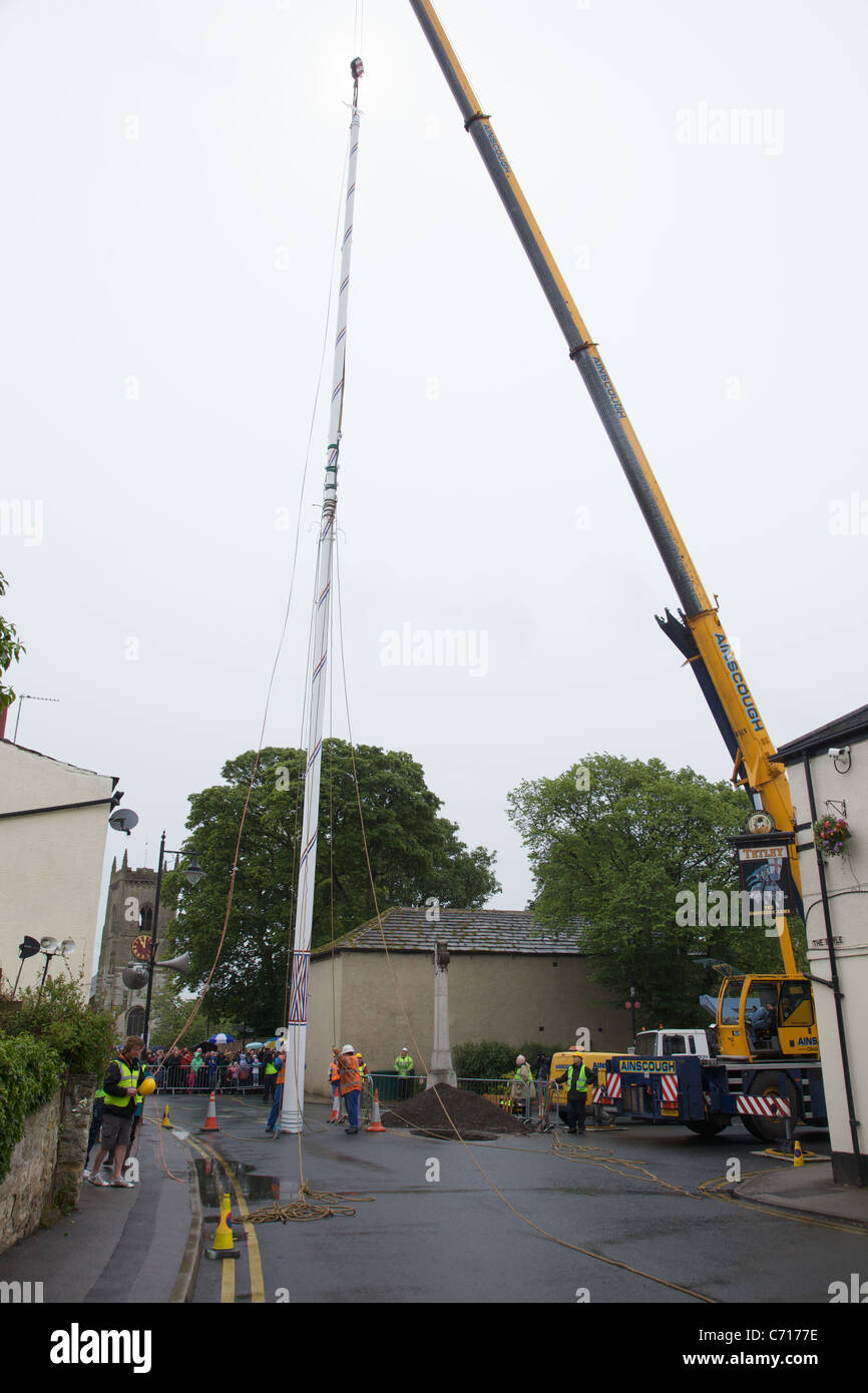 Maypole Barwick The newly decorated Maypole being put back into position at the center ...