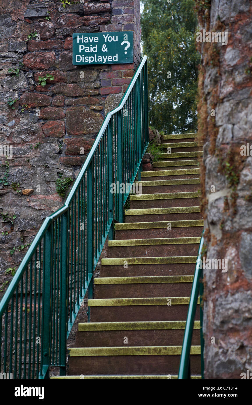 Have you paid & displayed? sign at top of steps from car park Stock