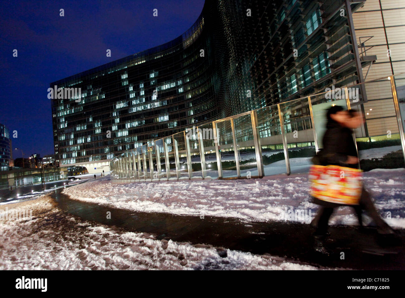 European Commission's headquarters pictured at night and covered by snow Stock Photo