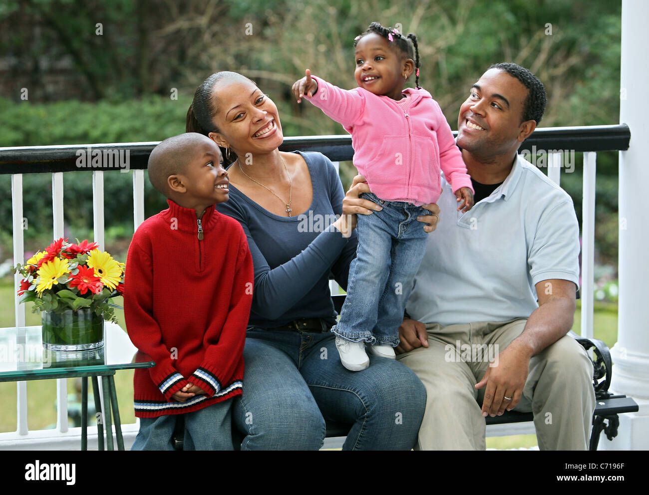 African-American family poses on a porch Stock Photo - Alamy