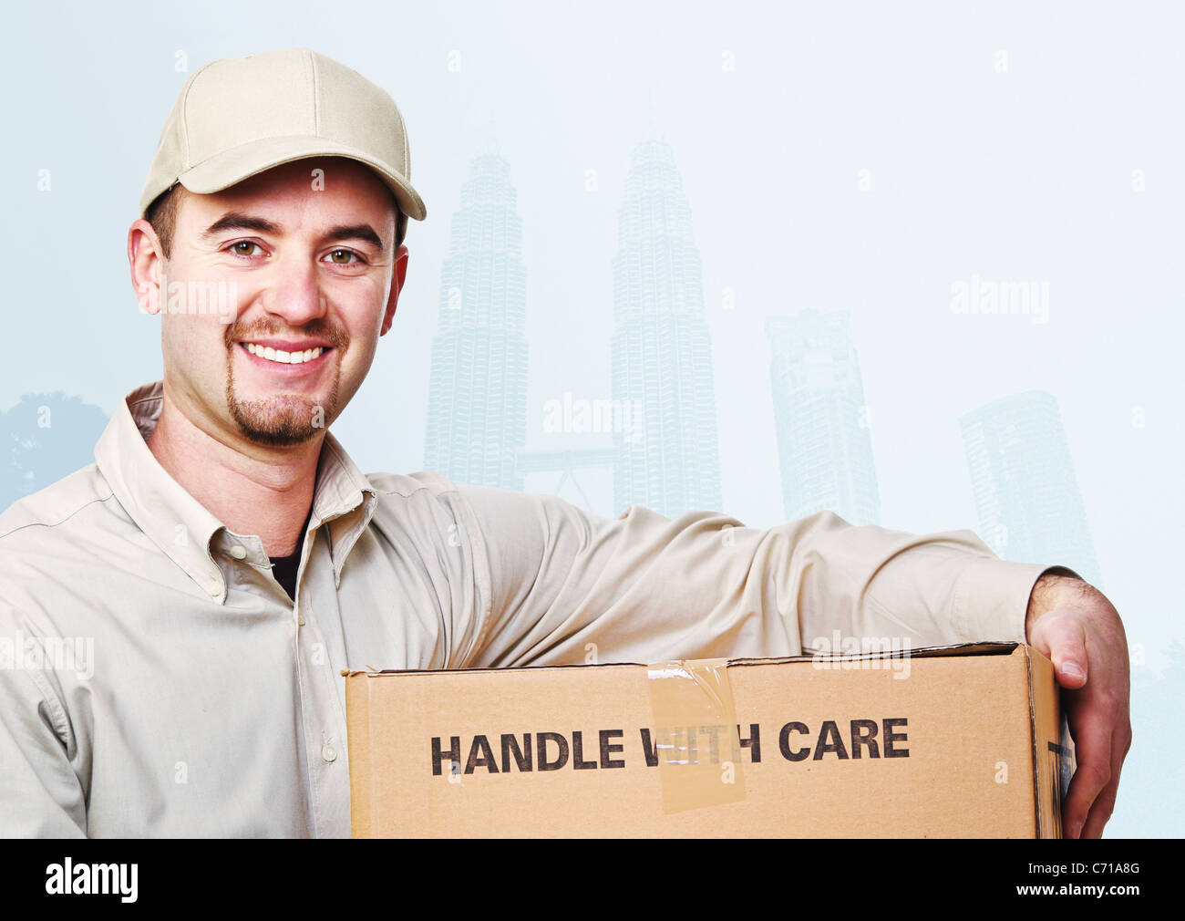 smiling delivery man and asian town background Stock Photo - Alamy
