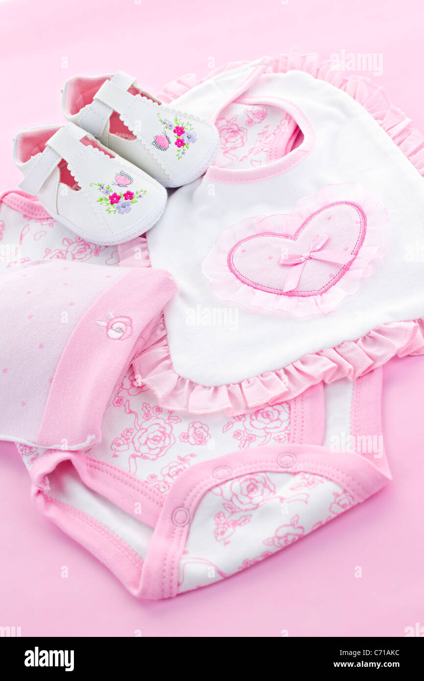 Pink infant girl clothing for baby shower Stock Photo Alamy