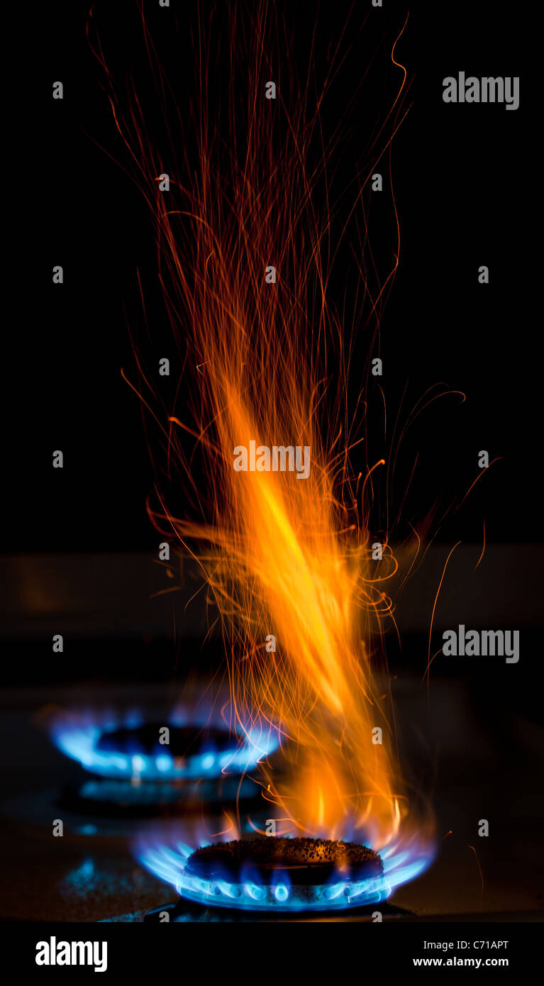flame sand sparks over gas stove Stock Photo Alamy