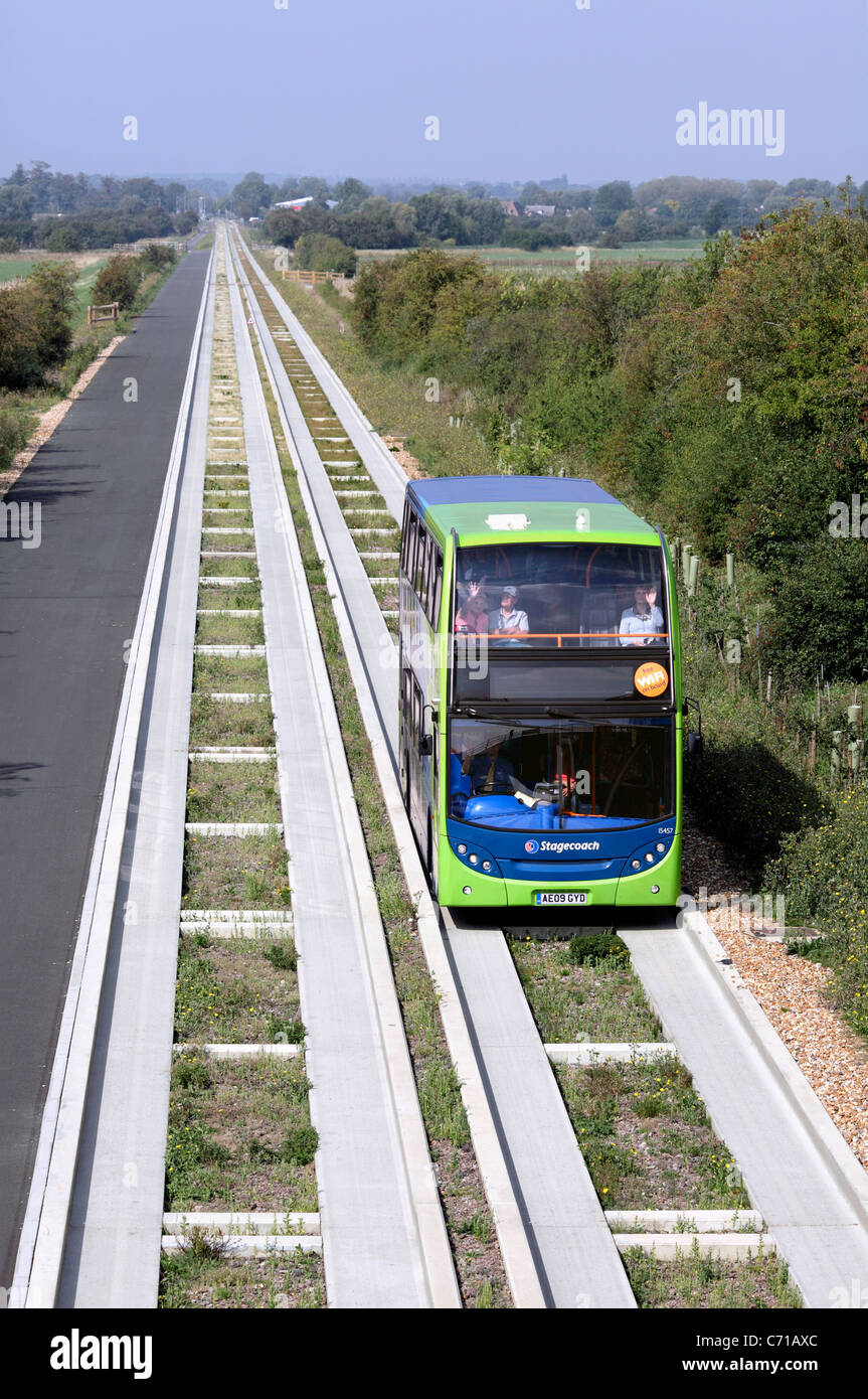 A guided bus on the guided busway between Cambridge and St. Ives, Cambridgeshire. Stock Photo