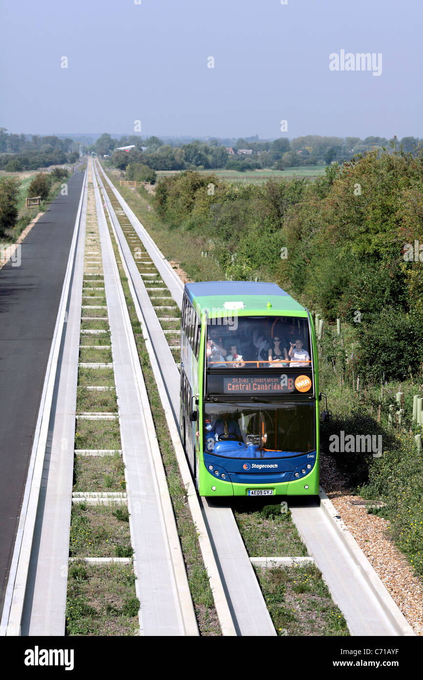 A guided bus on the guided busway between Cambridge and St. Ives, Cambridgeshire, UK. Stock Photo