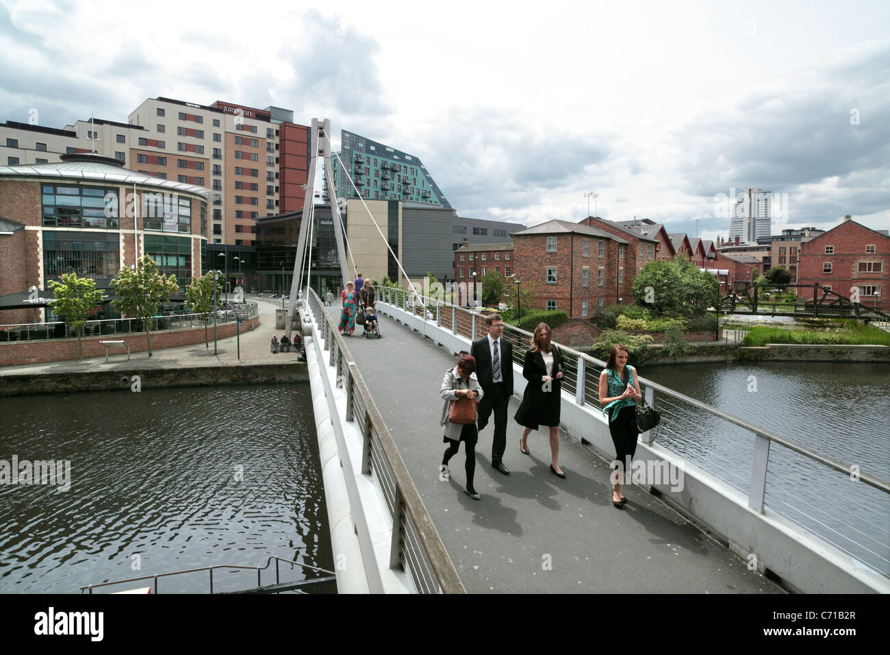 The Centenary Bridge, a footpath link across the River Aire in Leeds, opened in 1992. Stock Photo