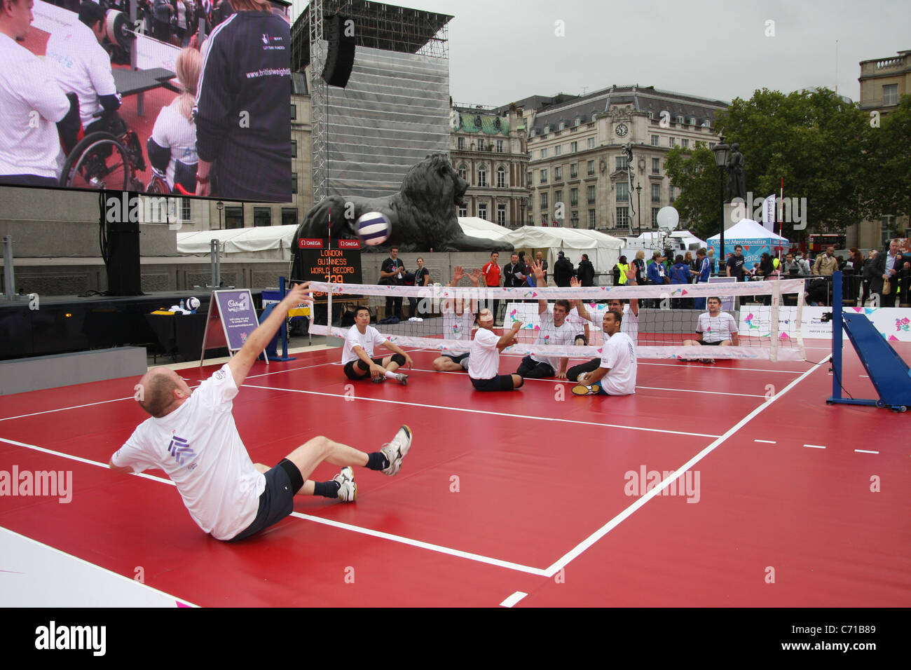 Sit down volleyball. International Paralympic Day in Trafalgar Square to promote the London 2012 Paralympic games. Stock Photo