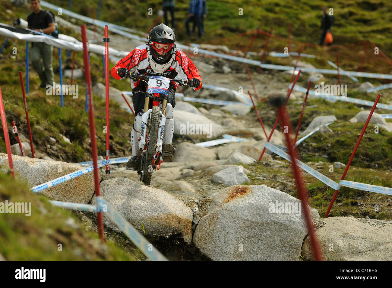 2011 UCI Junior Women's Downhill Mountain Bike World Champion and World Cup Champion Manon Carpenter racing at Fort William. Stock Photo