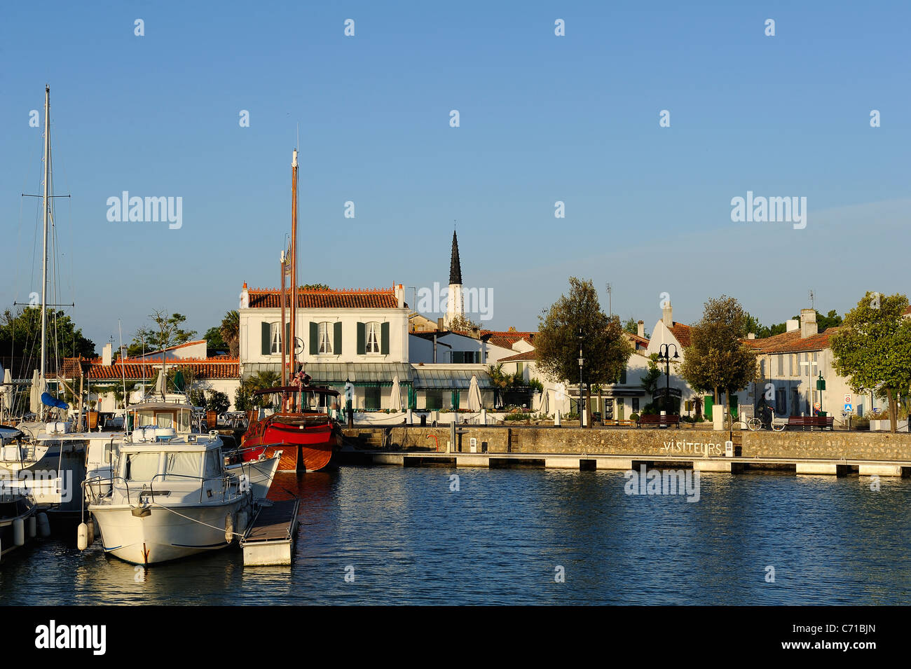 Sailing boats moored in Ars en Ré harbor, Charente Maritime department, West of France Stock Photo