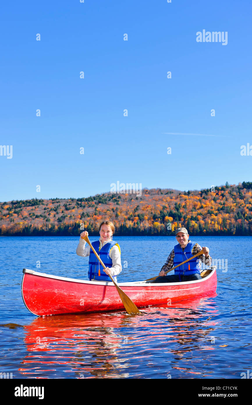 Family canoeing on Lake of Two Rivers, Ontario, Canada Stock Photo