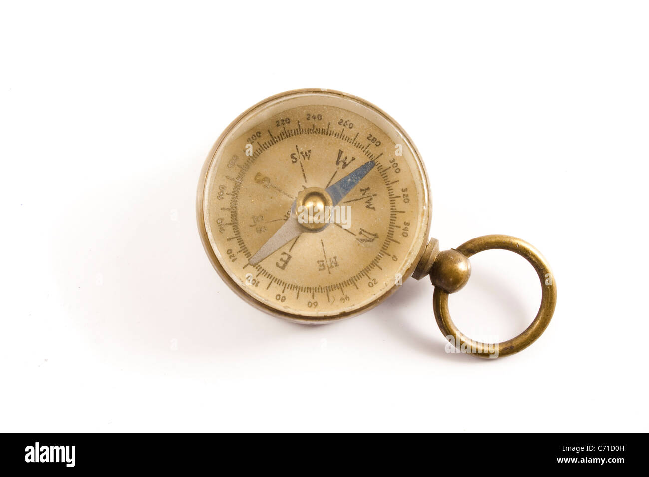 Antique Worn and Faded Old Brass Compass Isolated on White Background Stock Photo