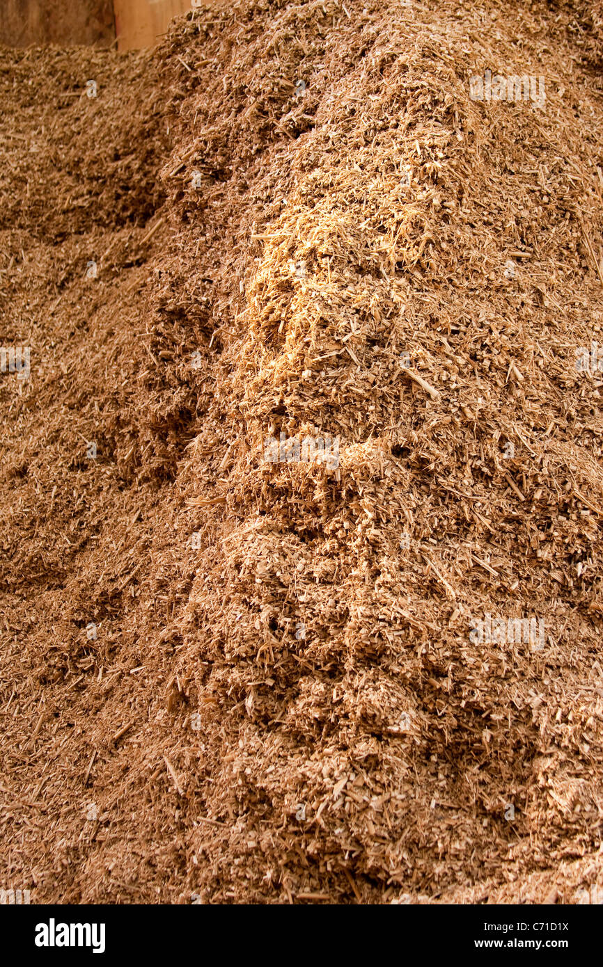 Biofuel Pile of Chopped Environmentally Friendly Biomass Material Stock Photo