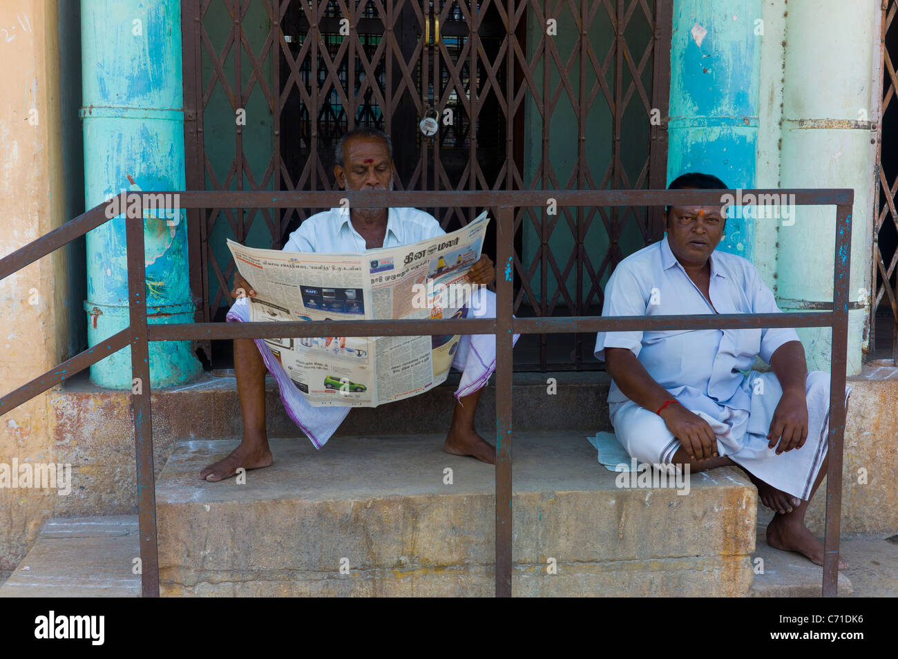 Man reading newspaper on porch hires stock photography and images Alamy