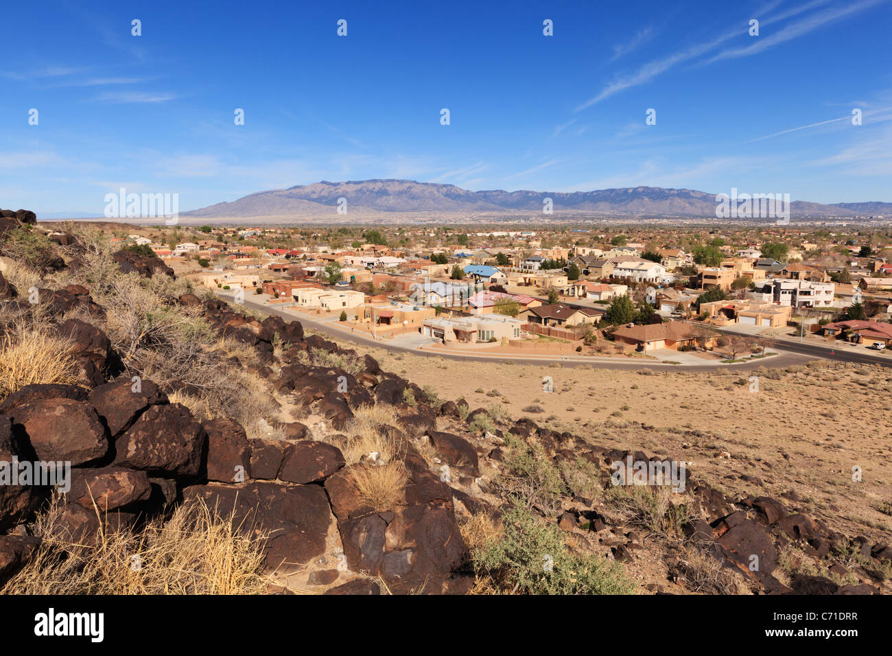 View from Petroglyph National Monument over Albuquerque toward Sandia Peak.  New Mexico, USA. Stock Photo