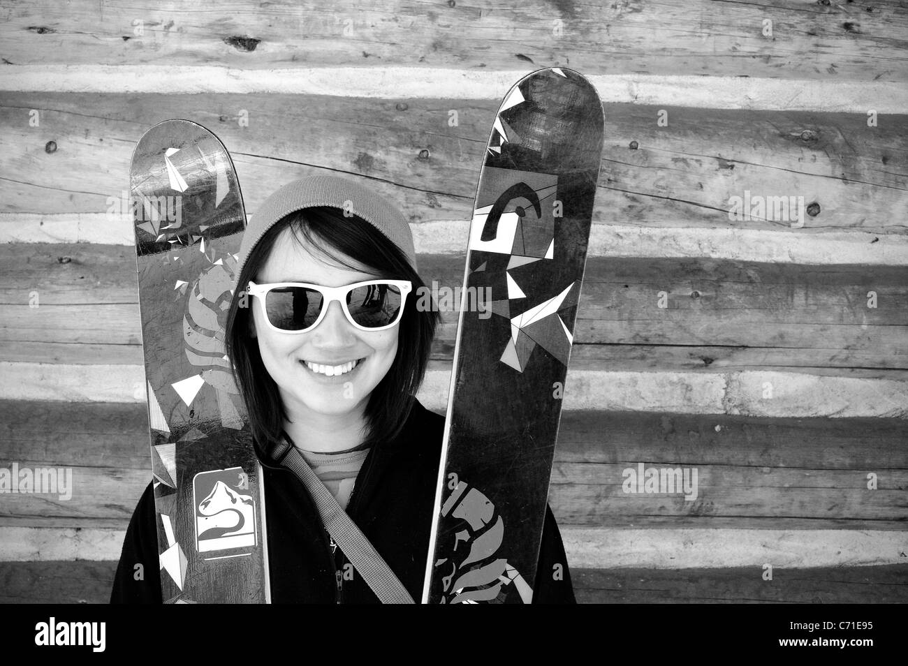 Girl and her skis smile. Stock Photo