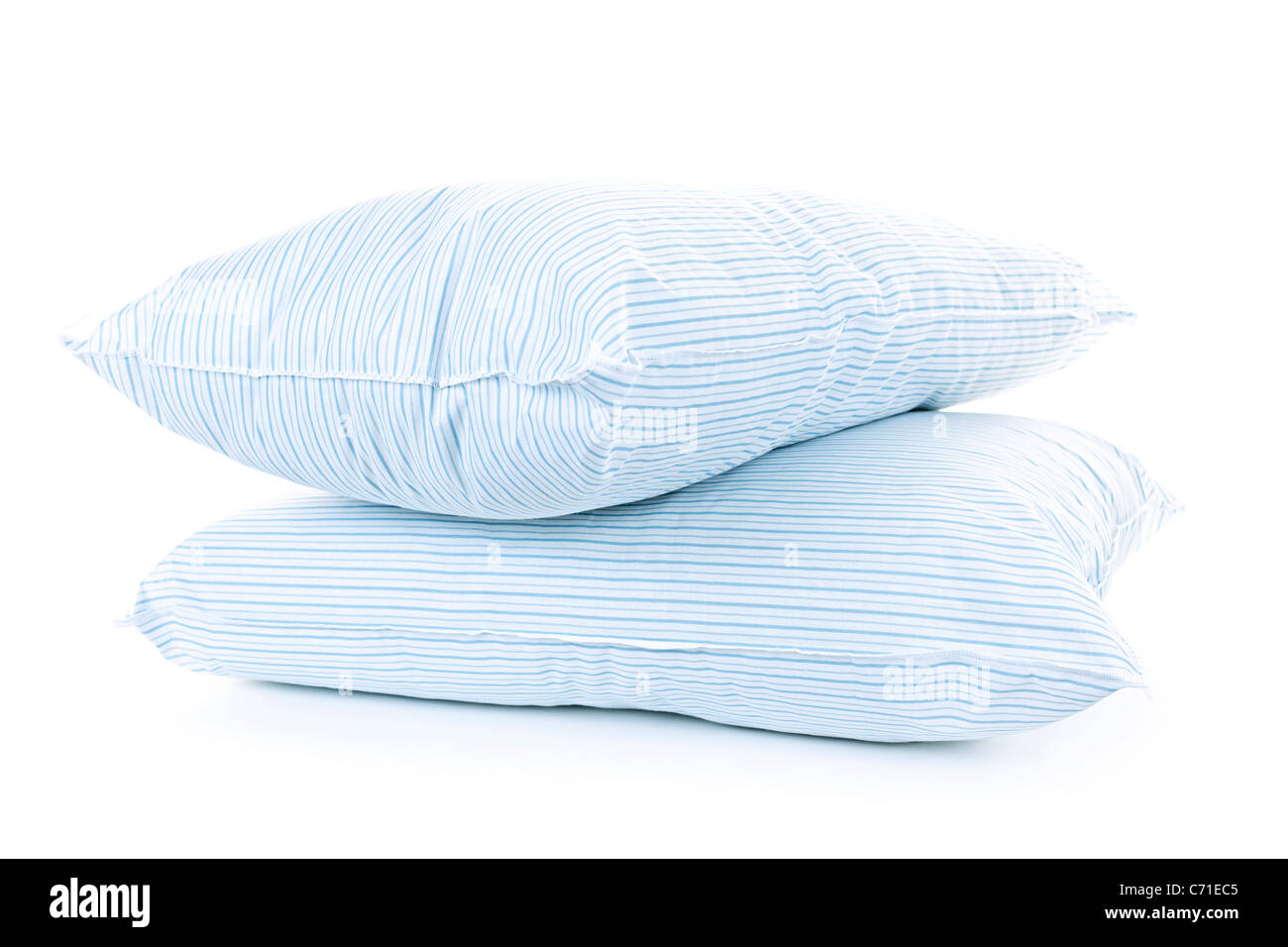 Two soft pillows with blue striped covers isolated on white background Stock Photo
