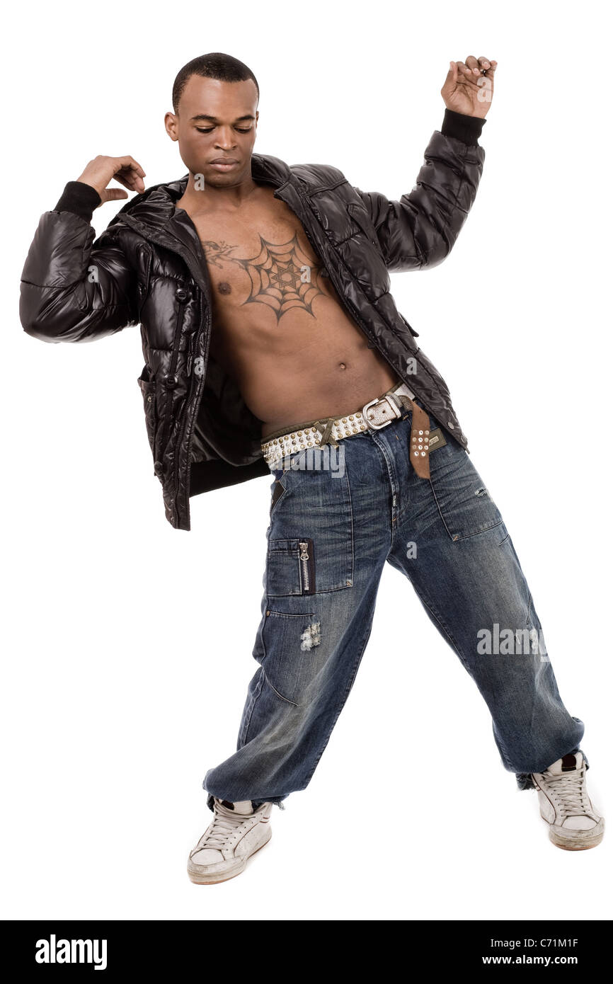 Street dancer performs rap dance on isolated background Stock Photo