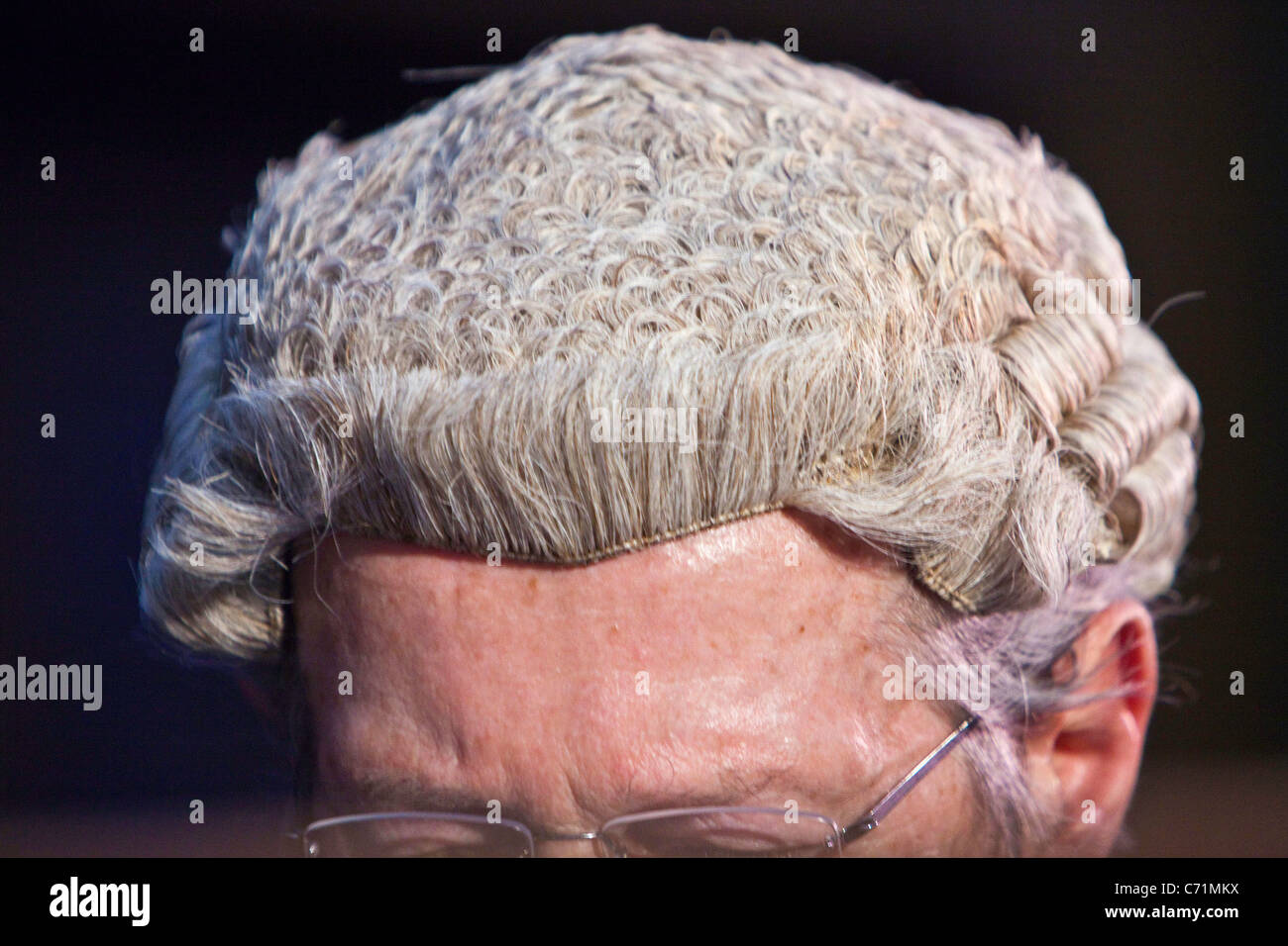 A barrister wearing the wig that is worn in all crown courts in England. Stock Photo