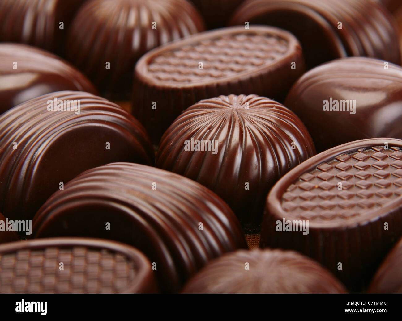 Closeup brown chocolate candy background Stock Photo