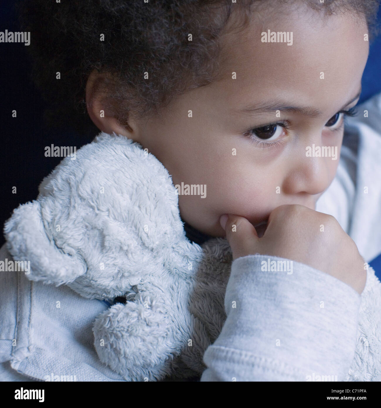 Little girl with stuffed toy, portrait Stock Photo - Alamy