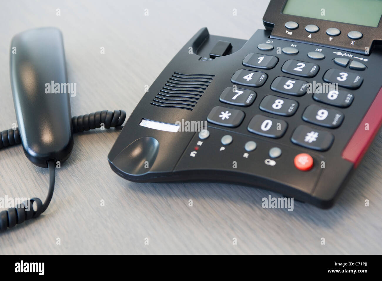 Receiver off landline phone Stock Photo