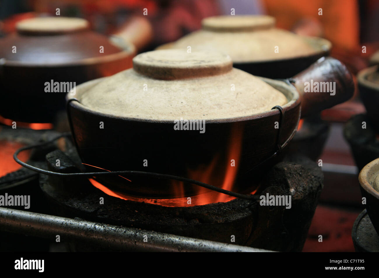 clay pot cooking at a street vendor stall in Kuala Lumpur, Malaysia Stock Photo