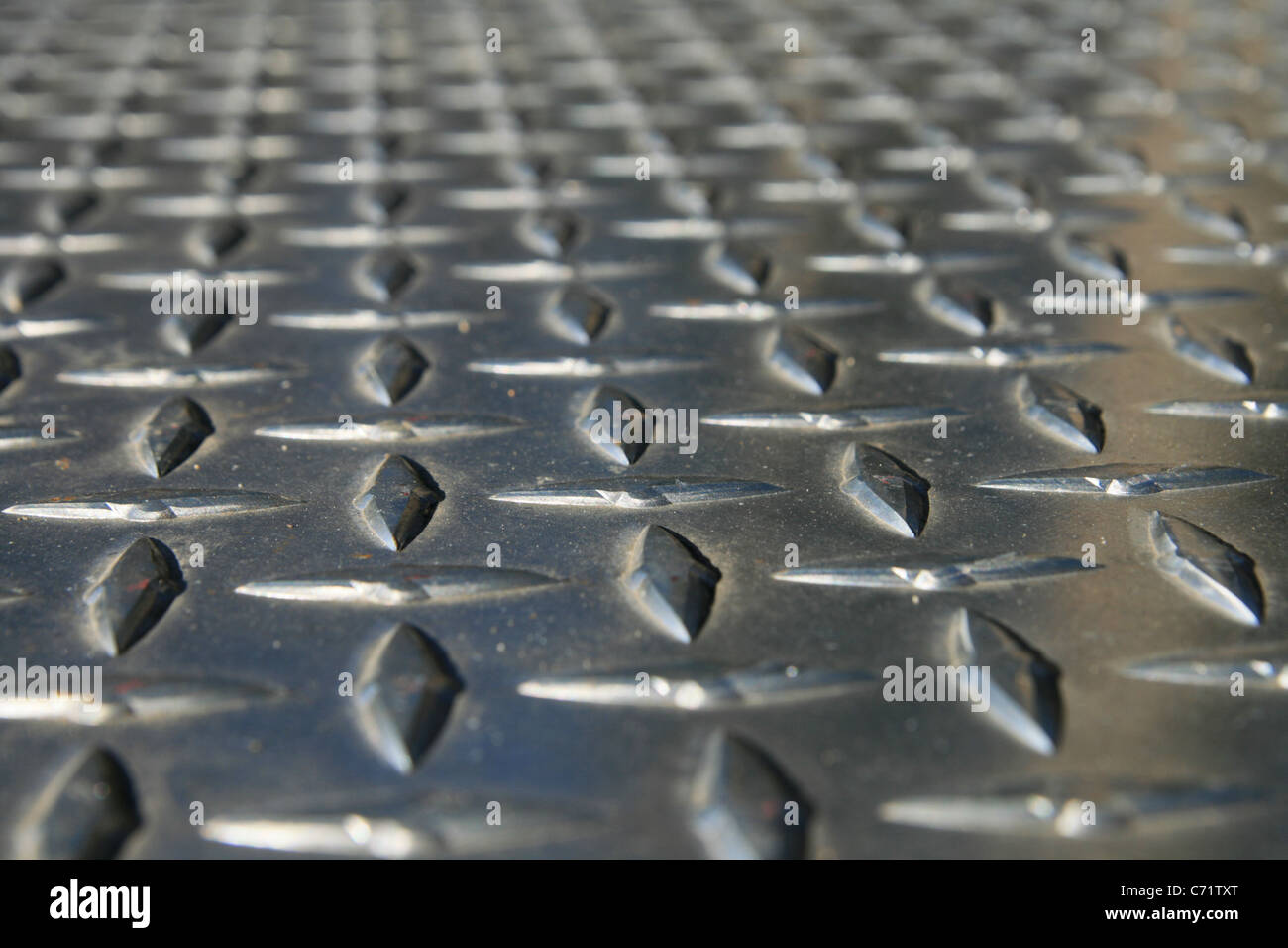 low angle image of diamond tread steel with shallow depth of field Stock Photo